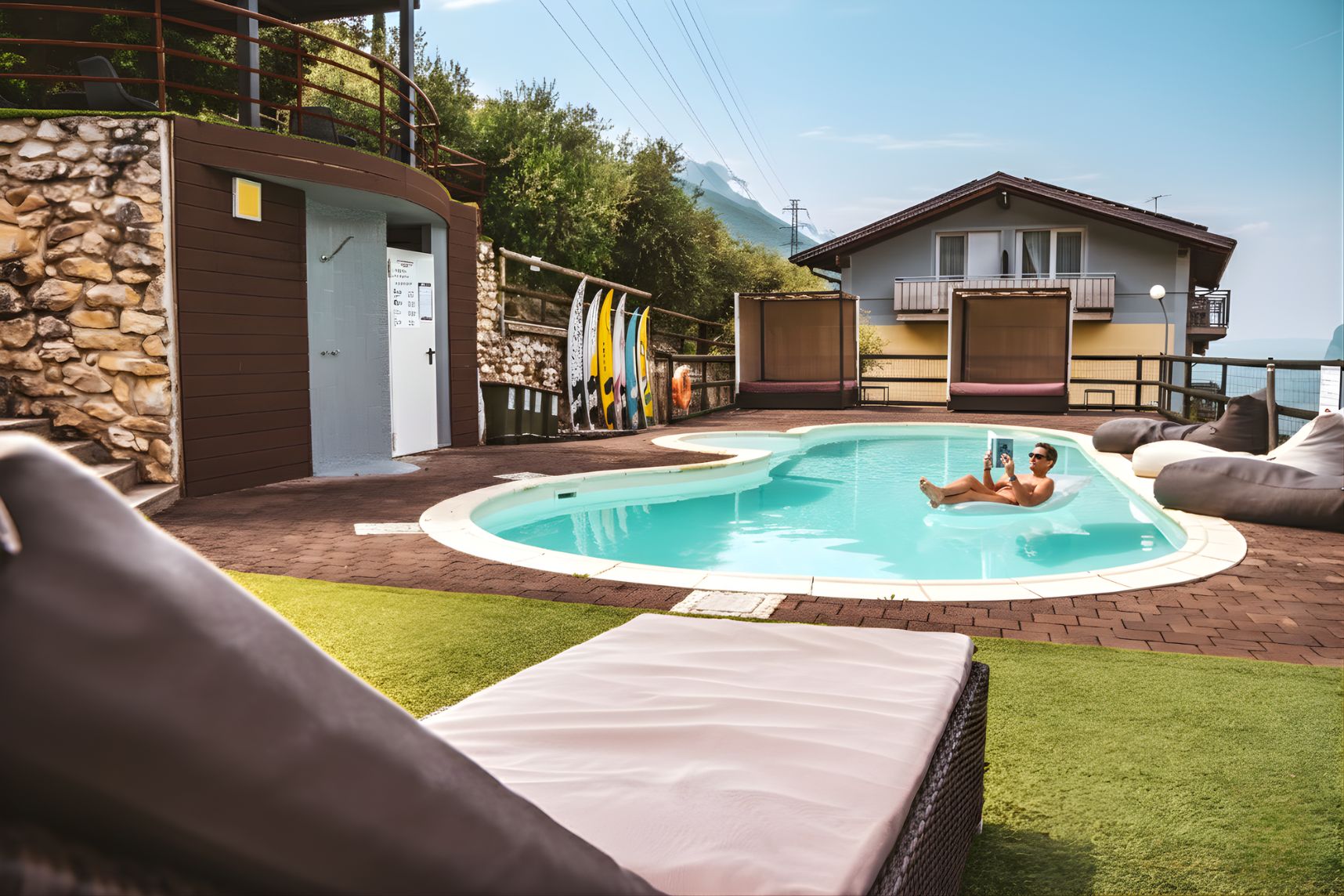 View from the pool towards Lake Garda, Hotel Isola Verde Nago-Torbole